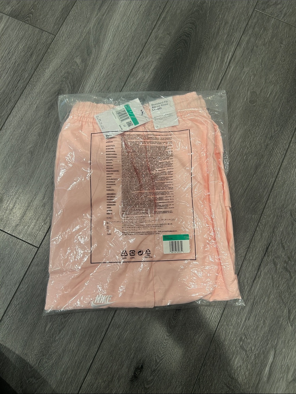 Nike Light Pink Athletic Shorts with White Logo